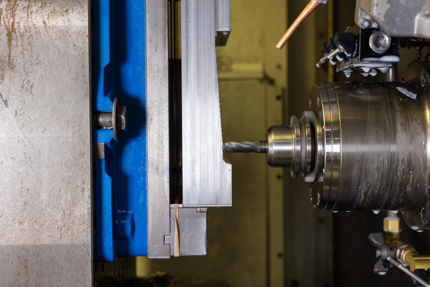 CNC horizontal milling machine running a part at New Tech Metals