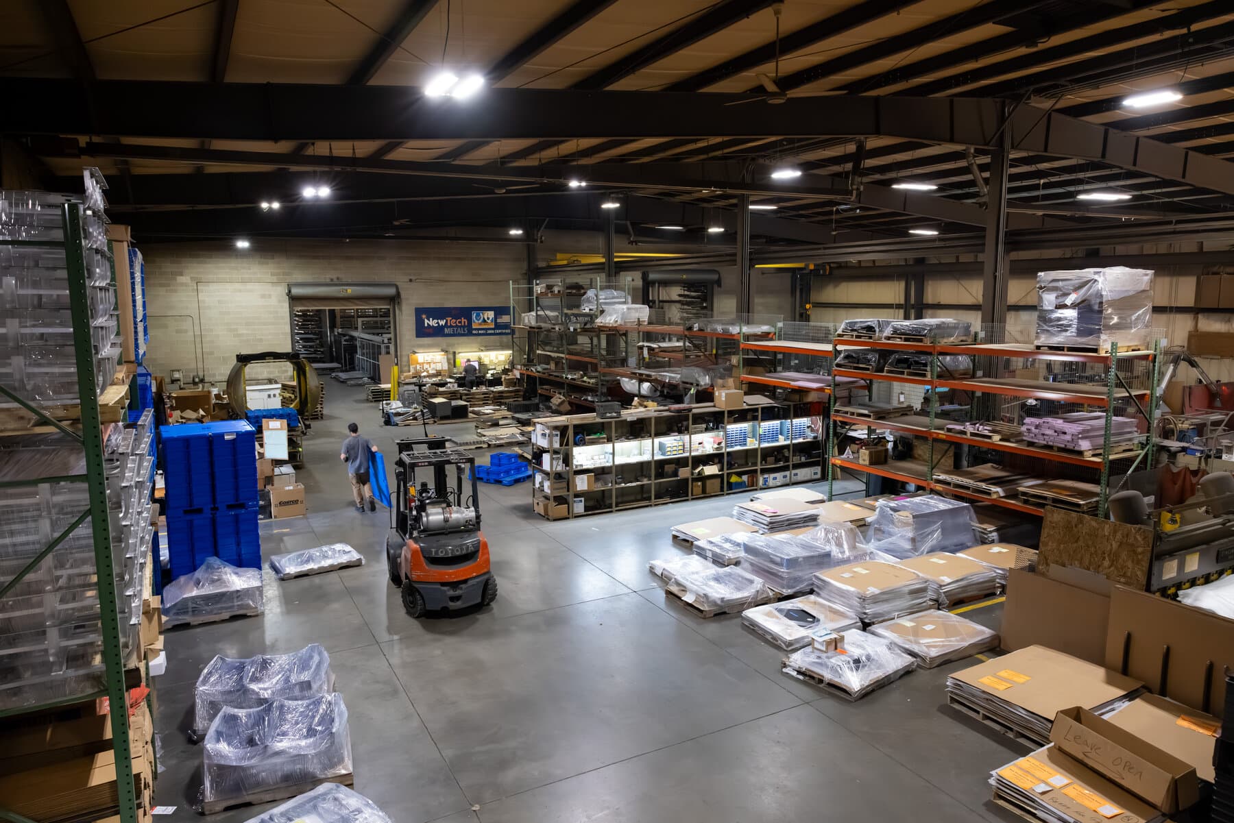 Finished parts staged in the New Tech Metals shipping and receiving area