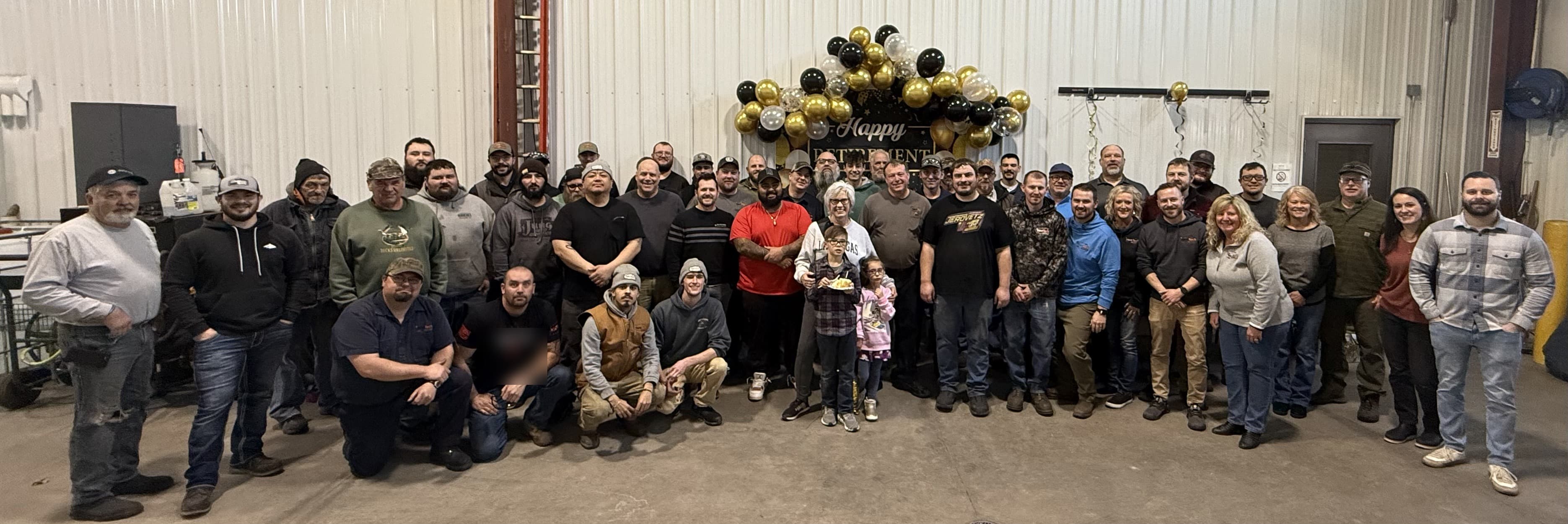 The New Tech Metals crew gathered on the shop floor in New Franken, Wisconsin
