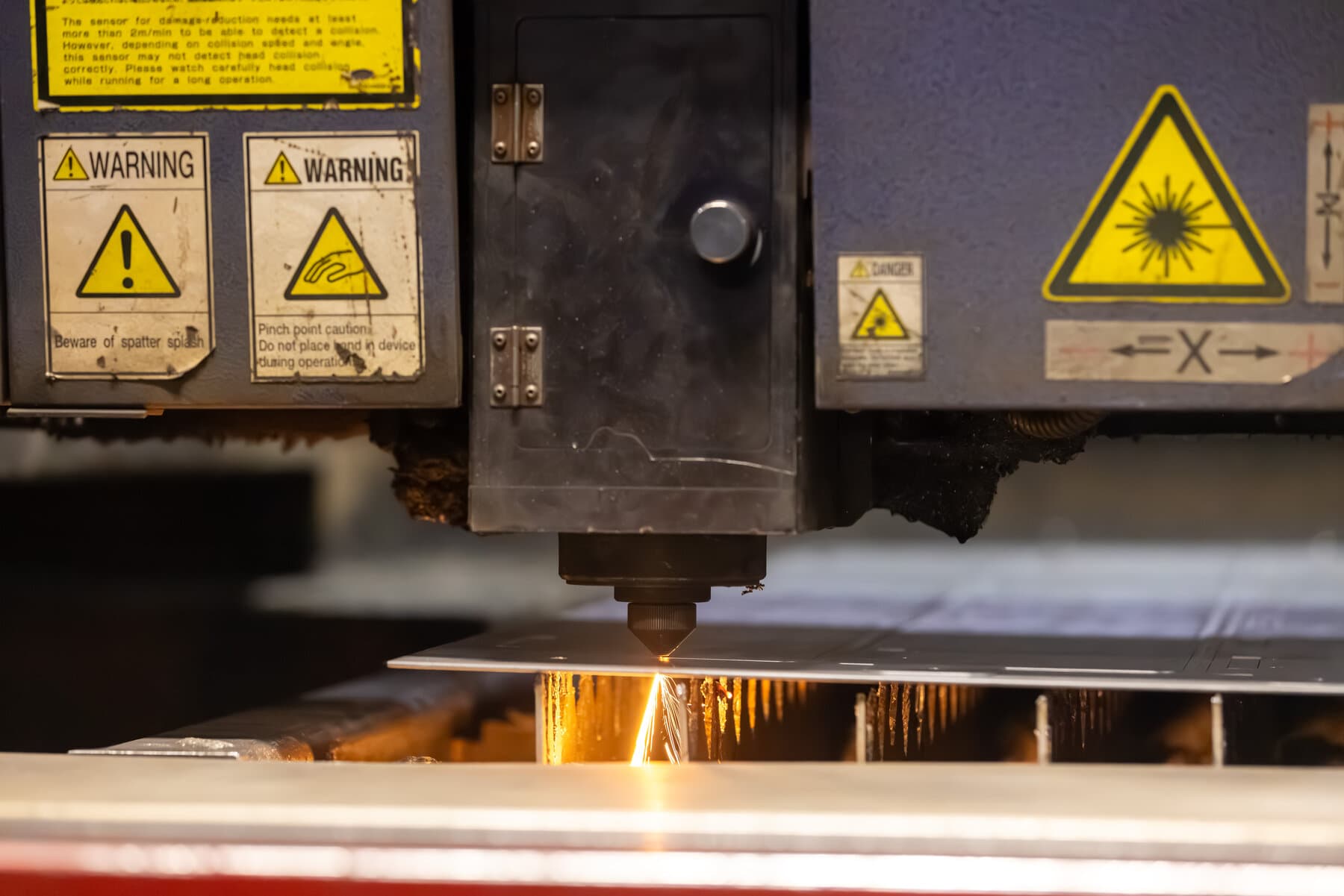 Mitsubishi CO2 laser cutting sheet metal at New Tech Metals