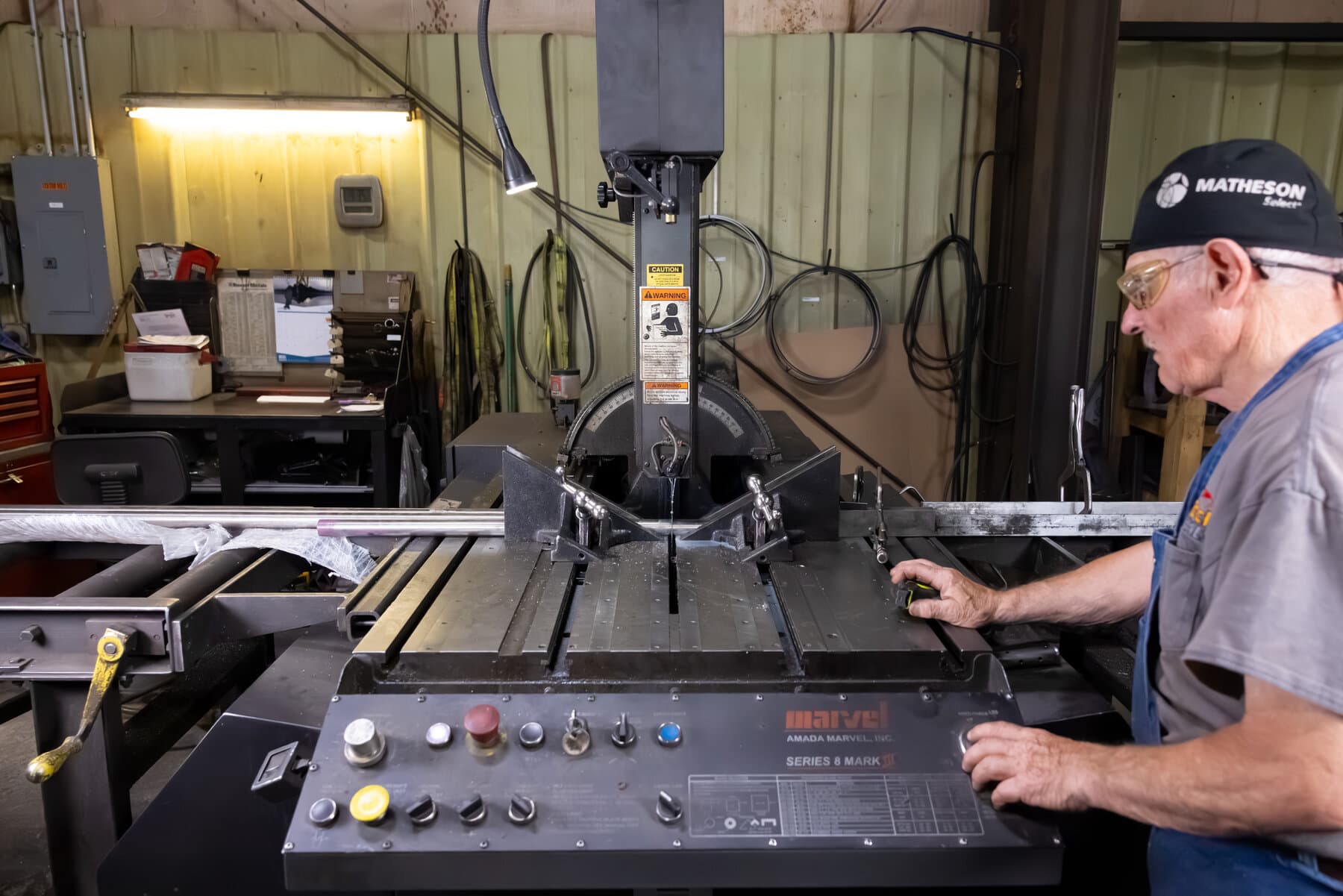 Operator running a Marvel Series 8 band saw