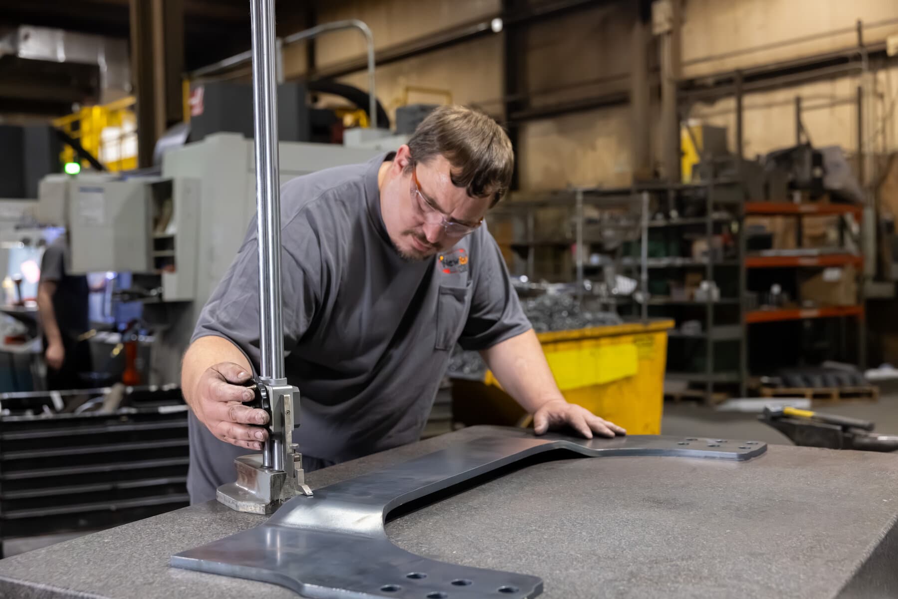 Height gauge inspection of a formed metal part on the shop floor