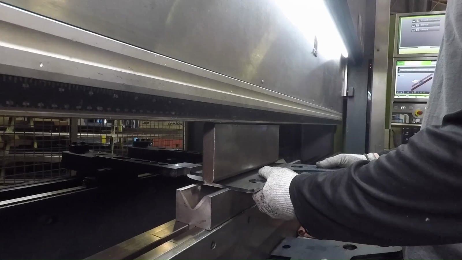 Two Safan Darley CNC press brakes on the New Tech Metals shop floor with two operators forming sheet metal